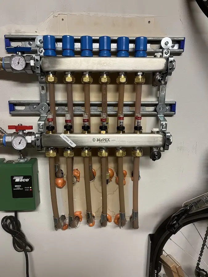 Plumber performing Water Heater Repair at a residential property in Riverdale